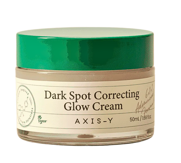 A jar of AXIS-Y Dark Spot Correcting Glow Cream, 50ml, with a white, branded label.